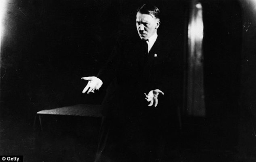 Spin a web - catch a fly? Archived photographs show that Adolf Hitler practised his body language and never intended for the photographs to be viewed by the public.