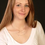 The uneven smile. This one is a fake!